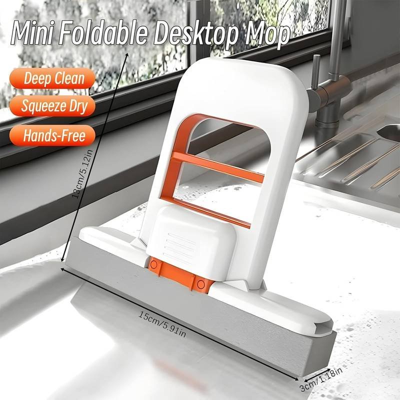 inbound4978519610324978255 Mini Foldable Desktop Mop – Portable Mini Cleaning Sponge Mop bathroom tiles, and small spaces - Image 1